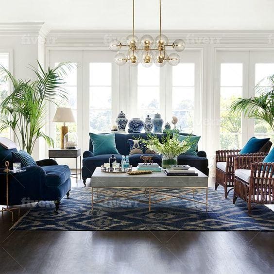 Blue living room furniture on large rug.